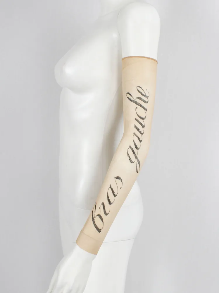 Ann Demeulemeester sheer sleeve with cursive “Bras Gauche” lettering — spring 1998