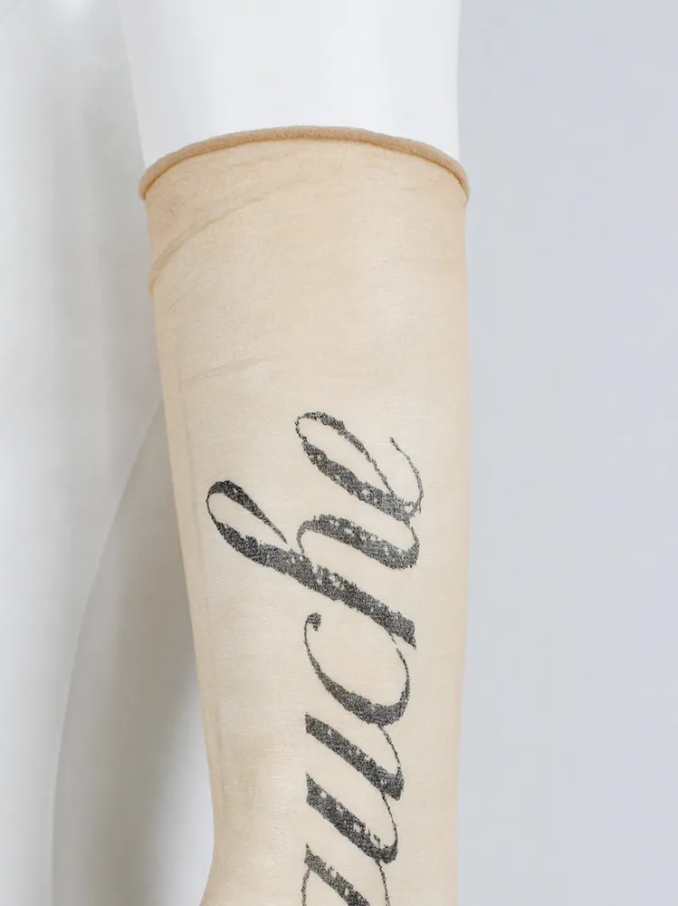 Ann Demeulemeester sheer sleeve with cursive “Bras Gauche” lettering — spring 1998