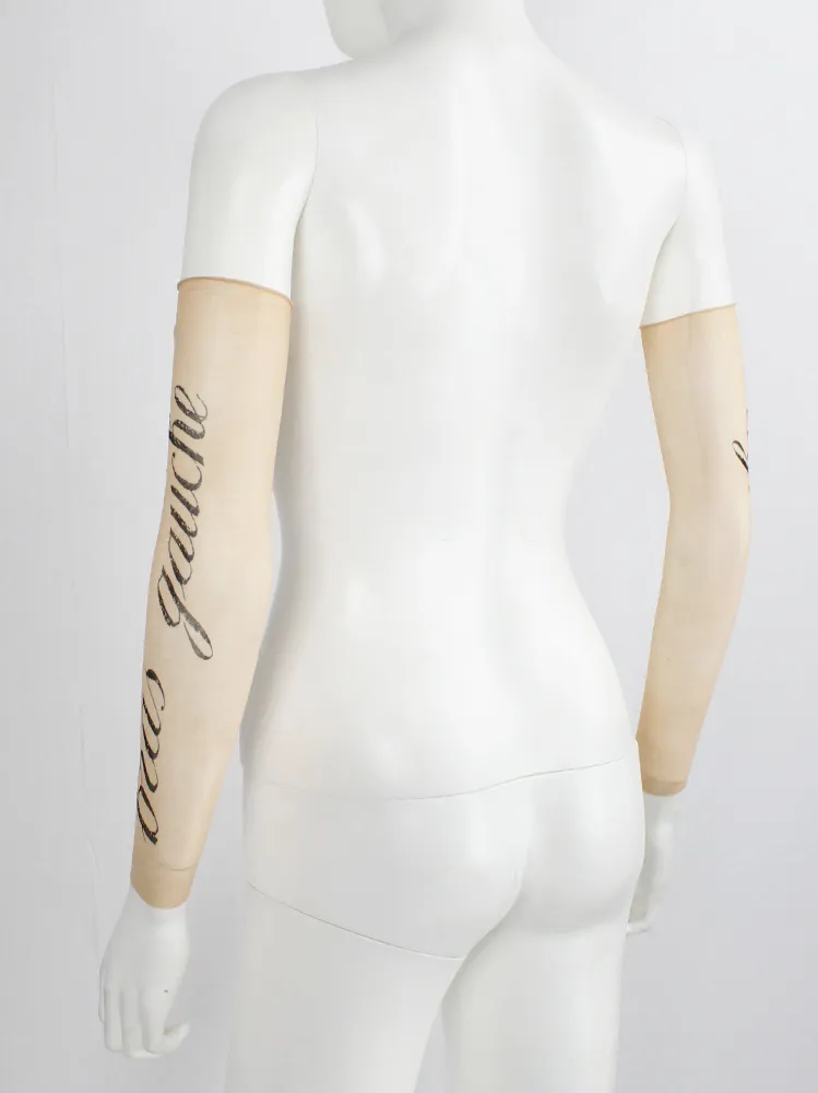 Ann Demeulemeester sheer sleeve with cursive “Bras Gauche” lettering — spring 1998